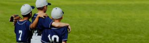 Baseball Safety: Young players pictured arm in arm before a game