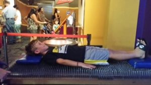 Supplements: Young athlete sleeps on a bed of nails