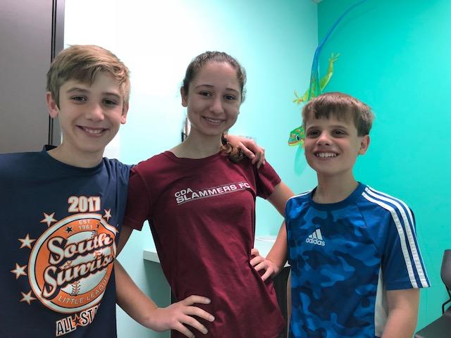 Sports Physicals: Picture of three young athletes
