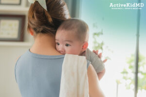 active kid md baby spitting up normal part of life